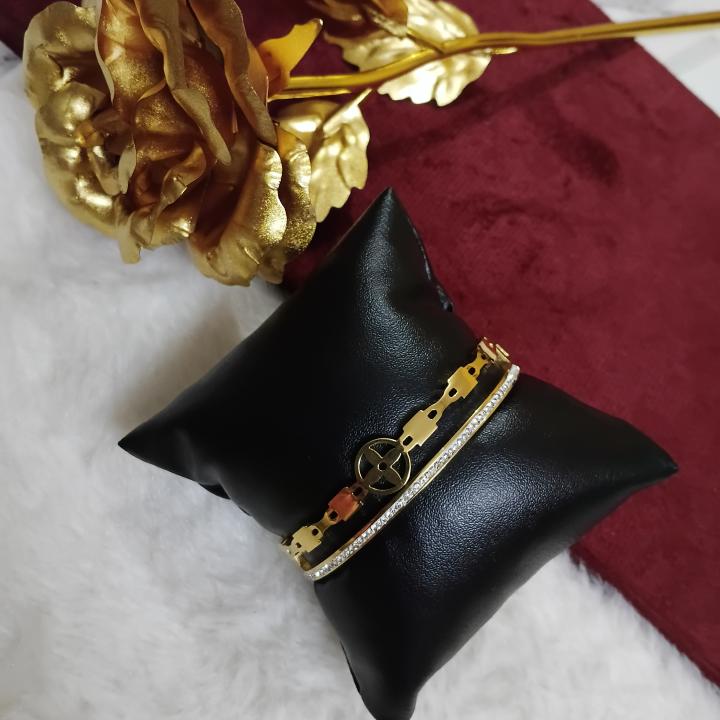 Gold-Toned Bangle Bracelet Featuring Embedded Crystals Line & A Charm Of Cross Floral Design