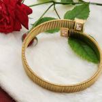 Gold Cuff Snake Bracelet Featuring Two Square Light Pink Gemstones
