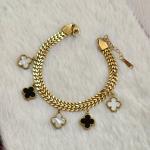 Iconic Black & White Clover Motif Charms Gold Bracelet