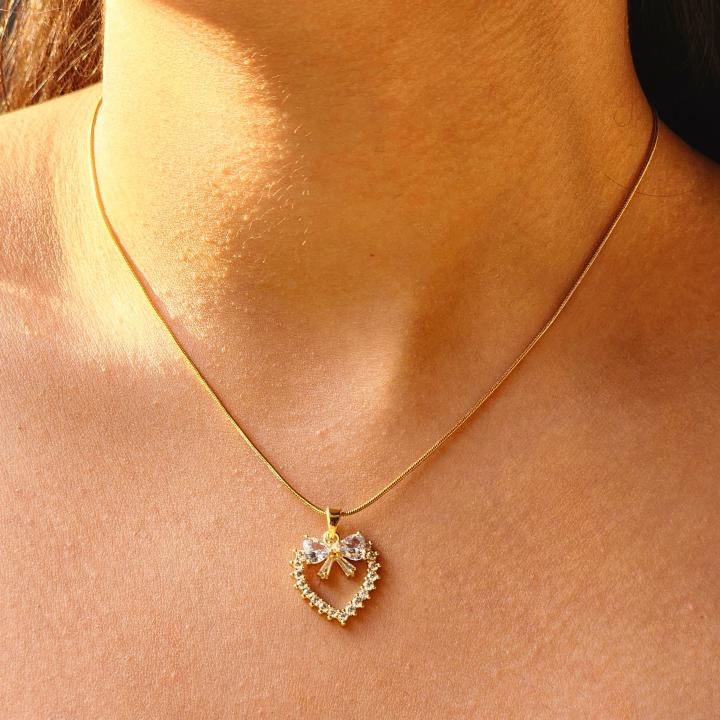 Elegant Gold-Plated Heart Pendant Necklace with Crystal Bow Accent
