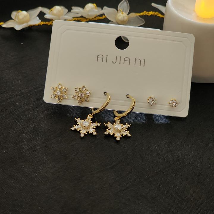 Snowflake Designed Earrings Embellished With Amarican Diamond Gemstones ( Set Of 3 )