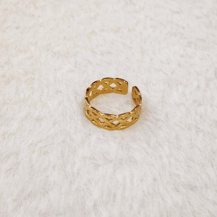 A Gold Celtic Knot Ring, Specifically A Claddagh Ring