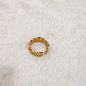 A Gold Celtic Knot Ring, Specifically A Claddagh Ring