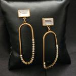 Gold Dangle Earrings With Engraved Gemstones