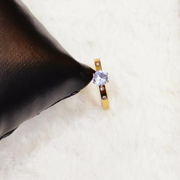 Cartier Engagement Gold Ring With A Prominent Round-Cut Center Gemstone
