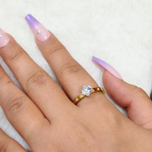 Cartier Engagement Gold Ring With A Prominent Round-Cut Center Gemstone