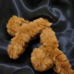 Caramel Cloud Fuzz Clutcher