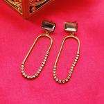 Gold Dangle Earrings With Engraved Gemstones