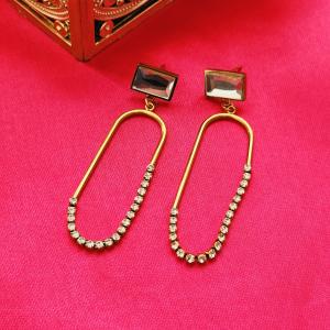 Gold Dangle Earrings With Engraved Gemstones