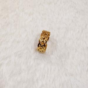 A Gold Celtic Knot Ring, Specifically A Claddagh Ring