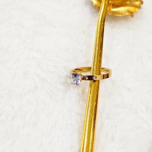 Cartier Engagement Gold Ring With A Prominent Round-Cut Center Gemstone