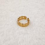 A Gold Celtic Knot Ring, Specifically A Claddagh Ring